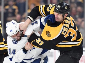Boston Bruins defenceman Zdeno Chara fights Tampa Bay Lightning left wing Pat Maroon at TD Garden. (Bob DeChiara-USA TODAY Sports)