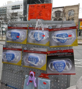 It was business as usual at curbside stores and fresh produce markets along Spadina Ave. in Chinatown on Thursday, March 26, 2020. (Jack Boland/Toronto Sun/Postmedia Network)