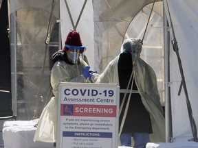 A COVID-19 Assessment Centre is set up outside of Scarborough Health Network - Birchmount Hospital in Toronto, Saturday, March 21, 2020.