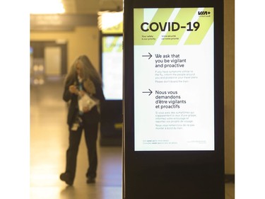 Multiple sign boards at Union Station alert staff and passengers ready to use VIA Rail about COVID-19. New domestic travel restrictions will be put in place Monday by the federal government - towards flight and rail travel  on Saturday March 28, 2020. Jack Boland/Toronto Sun/Postmedia Network