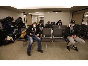 A group of five Czech hockey players who play for the Kingsville Kings Tier II Jr. A. hockey team- near Windsor - took a train from Windsor and await a second one to Montreal before boarding a special flight in Montreal back to the Czech Republic on Saturday March 28, 2020. Jack Boland/Toronto Sun/Postmedia Network