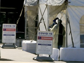 A COVID-19 Assessment Centre is set up outside of Scarborough Health Network - Birchmount Hospital on Saturday, March 21, 2020. (Veronica Henri/Toronto Sun/Postmedia Network)