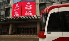 A streetcar passes the Princess of Wales Theatre in Toronto on Saturday March 28, 2020. Jack Boland/Toronto Sun