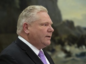 Ontario Premier Doug Ford delivers a message via video to Ontario residents from his office regarding the province's efforts to manage the coronavirus pandemic on Friday, March 13, 2020. (Stan Behal/Toronto Sun/Postmedia Network)