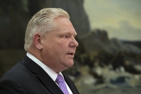 Ontario Premier Doug Ford delivers a message via video to Ontario residents from his office regarding the province’s efforts to manage the coronavirus pandemic on Friday, March 13, 2020. (Stan Behal/Toronto Sun/Postmedia Network)