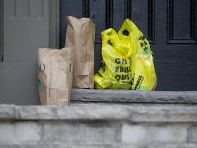 Good Samaritans are pitching in to ensure seniors and other vulnerable Torontonians, who are unable to leave home during the COVID-19 outbreak, have groceries delivered to their door. (Stan Behal/Toronto Sun/Postmedia Network)