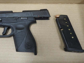 Shea Darrell, 30, of Toronto, faces a dozen charges for allegedly fleeing from cops and ditching this handgun in Pickering on Friday, March 6, 2020. (Durham Regional Police)