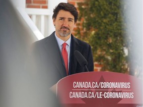 Canada's Prime Minister Justin Trudeau speaks to news media outside his home in Ottawa, Ontario, Canada March 25, 2020.