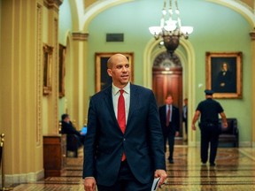Sen. Cory Booker (D-NJ) leaves the Senate floor after the motion failed in the attempt to wrap up work on coronavirus economic aid legislation in Washington, U.S., March 22, 2020.