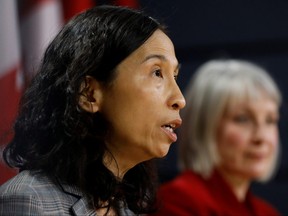 Chief Public Health Officer Dr. Theresa Tam, with Minister of Health Patty Hajdu, takes part in a news conference in Ottawa, March 9, 2020.