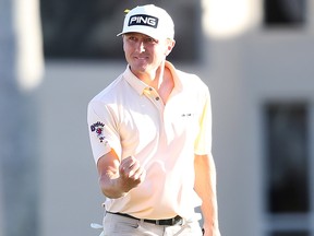 MacKenzie Hughes of Canada celebrates after making a birdie putt on the 17th hole during the final round of the Honda Classic at PGA National Resort and Spa Champion course on March 1, 2020 in Palm Beach Gardens, Fla.