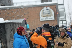 Four-time champion Martin Buser is interviewed prior to the ceremonial start of the Iditarod Trail Sled Dog Race. (IAN SHANTZ/TORONTO SUN)