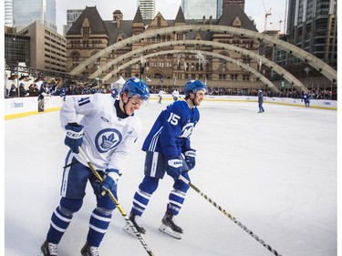 Toronto Maple Leafs Dmytro Timashov (left) and Alexander Kerfoot   during the team's annual outdoor skate at Nathan Philips Square in Toronto, Ont. on Thursday January 9, 2020.