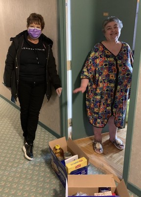 Sun Columnist Sue-Ann Levy pitches in with the B’nai Brith emergency food drive and delivers supplies to Ganna Reznik, 71, and her husband on Thursday, March 26, 2020. (supplied photo)