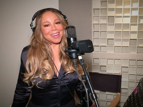 Mariah Carey live-streamed from her home as part of iHeartRadio's coronavirus benefit.