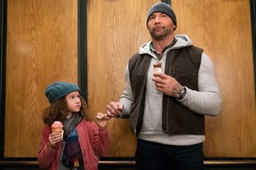 Chloe Coleman and Bautista in My Spy. (Elevation Pictures)