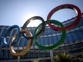 The Olympic Rings logo is pictured in front of the headquarters of the International Olympic Committee in Lausanne, Switzerland, March 18, 2020.