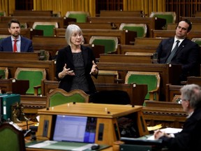 Minister of Health Patty Hajdu speaks in the House of Commons as legislators convene to give the government power to inject billions of dollars in emergency cash to help individuals and businesses through the economic crunch caused by the COVID-19 outbreak, on Parliament Hill in Ottawa, Wednesday, March 25, 2020.
