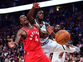 Denver Nuggets forward Jerami Grant (9) collides with Raptors forward Rondae Hollis-Jefferson during the second half at the Pepsi Center on Sunday night. (Ron Chenoy/USA TODAY Sports)