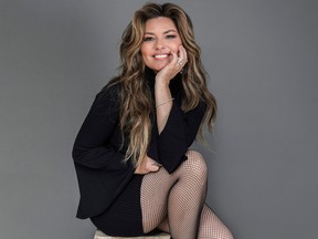 Shania Twain poses for a portrait at her Manhattan hotel, Friday, June 14, 2019, in New York. Twain co-stars in the new movie I Still Believe. (Christopher Smith/Invision/AP)