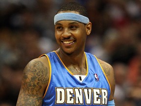 Forward Carmelo Anthony began his NBA career with the Denver Nuggets after the Detroit Pistons passed over him in the 2003 NBA draft. (RONALD MARTINEZ/Getty Images files)