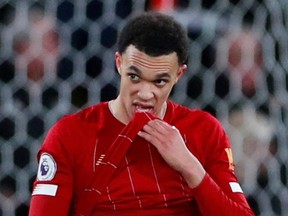 Liverpool’s Trent Alexander-Arnold reacts after Watford scored its second goal on Feb. 29, 2020, at Vicarage Road. Watford defeated Liverpool 3-0 for Liverpool’s first EPL loss this season.  (ANDREW COULDRIDGE/Reuters)