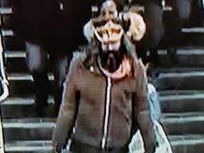 Investigators need help identifying this man, who is suspected of trying to push a TTC rider onto the train tracks at Bathurst Station on Monday, Nov. 18, 2019. (Toronto Police handout)