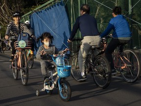 Taiwanese enjoy the spring weather in Dadaocheng park in Taipei, Taiwan on March 15, 2020. (Paula Bronstein/Getty Images)