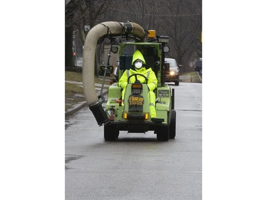 As Torontonians adjust to life during the Covid-19 pandemic;  a Toronto worker adapts to his job, on Sunday March 29, 2020. Stan Behal/Toronto Sun/Postmedia Network