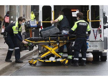 As Torontonians adjust to life during the Covid-19 pandemic;  Emergency Medical Services continue to respond to all calls, on Sunday March 29, 2020. Stan Behal/Toronto Sun/Postmedia Network