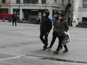 A few stay active on the empty streets of Toronto  on Friday March 20, 2020.