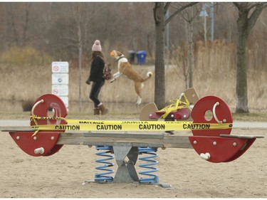 Children's playgrounds like at Woodbine Beach Park near Kingston Rd. and Queen St. East have been taped off by the City of Toronto on Thursday March 26, 2020. Jack Boland/Toronto Sun/Postmedia Network
