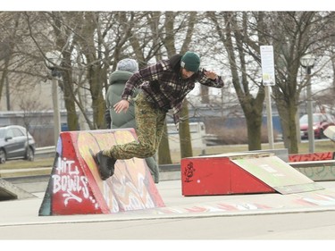Inline skaters and skateboarders were still using the ramps at Beach Skatepark at the bottom of Coxwell Ave. in the east end of the city  on Thursday March 26, 2020. Jack Boland/Toronto Sun/Postmedia Network