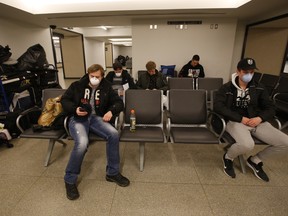 A group of five Czech hockey players who play for the Kingsville Kings Tier II Jr. A. hockey team- near Windsor - took a train from Windsor and await a second one to Montreal before boarding a special flight in Montreal back to the Czech Republic on Saturday March 28, 2020. Jack Boland/Toronto Sun/Postmedia Network