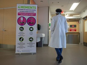 A sign for washing hands is seen during a media tour of quarantine facilities for treating novel coronavirus at Jewish General Hospital in Montreal, on March 2, 2020.