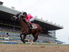 The Woodbine season was supposed to begin on April 18 but has been postponed due to the COVID-19 pandemic. No new start date has been announced. (Frank Gunn/THE CANADIAN PRESS)