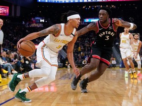 The Golden State Warriors (guard Damion Lee at left) were supposed to be in Toronto for the first time since last June. 
Instead, the league has begun a suspension of games for at least 30 days due to coronavirus.  (USA TODAY)