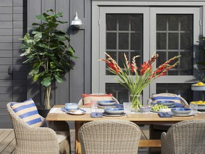 Transforming bare space into outdoor dining space adds to the 'at home' experience.