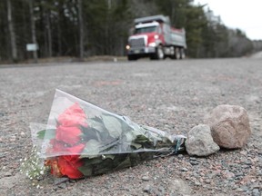Flowers lay at a crime scene at the side of the Plains Road April 20, 2020 in Debert, Nova Scotia, Canada.