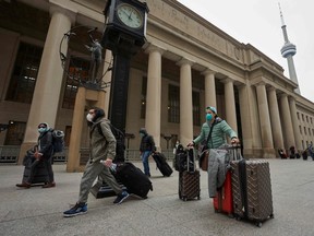 Travellers are pictured at Union Station on March 24, 2020. (AFP via Getty Images)