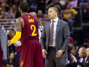 Kyrie Irving talks to head coach Tyronn Lue when the pair were with the Cleveland Cavaliers.