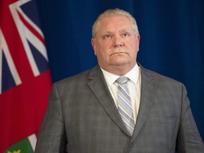 Ontario Premier Doug Ford fights back tears in the daily briefing at Queen's Park in Toronto on Thursday, April 23, 2020.