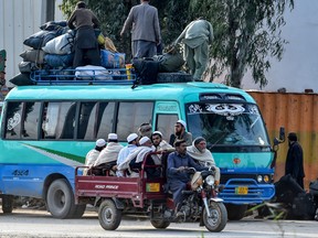 This file photo taken on March 13, 2020 shows Islamic worshippers leaving after attending the three-day annual Tablighi Jamaat religious gathering in Raiwind on the outskirts of Lahore, Pakistan. (ARIF ALI/AFP via Getty Images)