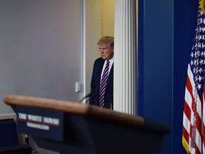 US President Donald Trump arrives for the daily briefing on the novel coronavirus, which causes COVID-19, in the Brady Briefing Room of the White House on April 24, 2020, in Washington, DC. (Photo by Olivier DOULIERY / AFP) (Photo by OLIVIER DOULIERY/AFP via Getty Images)