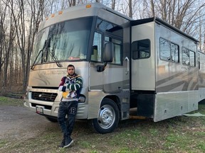 Niagara Falls boxer Lucas Bahdi poses outside his trailer in rural Ontario in April 2020. Bahdi is using the trailer as his training venue during the coronavirus.