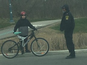 Toronto Police and city bylaw officers were out in Humber Bay Park West ready to ticket those breaching Ontario's physical distancing orders on Friday, April 3, 2020. (Joe Warmington/Toronto Sun/Postmedia Network)