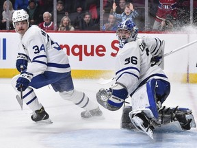 Goaltender Jack Campbell and forward Auston Matthews of the Toronto Maple Leafs.