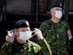 Canadian Armed Forces medical personnel are seen at a Montreal seniors' long-term care centre, as they arrive to assess and ease the ongoing situation in long-term care facilities in Quebec amid the outbreak of COVID-19, on Saturday, April 18, 2020.