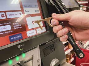 The CleanKey brass device was created during the pandemic to allow people to use the device rather than their hands at touchscreen grocery checkouts or bank machines.