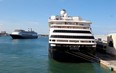 Cruise ships Zaandam (R) and Rotterdam of the Holland America Line, carrying patients affected by coronavirus disease (COVID-19), arrive at Port Everglades in Fort Lauderdale, Florida on April 2, 2020. (REUTER/Joe Skipper)